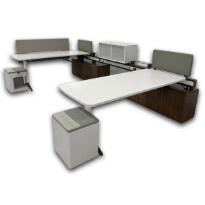 Used Kimball EverySpace Two Person Workstation The used Kimball EverySpace workstation is a modular benching system designed to support individual work while adapting to changing workplace needs. This configuration includes integrated storage, a power beam with built-in electrical access, privacy screens, and cushion-top mobile pedestals that provide both seating and secure storage. Height-adjustable work surfaces with paddle controls Power beam with integrated electrical access Storage bases, overhead storage, and cushion-top mobile pedestals with hinged lids Upholstered privacy panels to help define individual workspaces Modular design allows for future reconfiguration as office needs change Overall Dimensions: 138.5" W × 82" D × 33.5" H Mainly for commercial use. Ideal for corporate offices, collaborative workspaces, team environments, and open office floor plans.