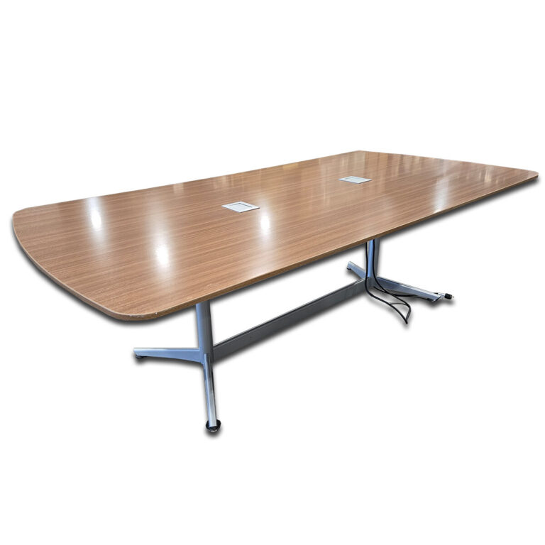 Used 8' Rectangular Conference Table With Power- Light Walnut  This 8-foot conference table features a warm wood finish and sleek metal base, ideal for meeting spaces or collaborative offices includes two power boxes for device charging.  Spacious 8' top comfortably seats up to eight people Two Built-in power boxes Metal base for stability and modern appearance Durable laminate surface for easy cleaning and long-term use Dimensions: 96"W x 48"D x 30"H Perfect for conference rooms, meeting areas, and collaborative work environments.