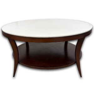 Used 36" Round Coffee Table - White Top W/ Mahogany Frame  The Used 36" Round Coffee Table provides a functional surface for magazines, beverages, décor, and personal items in reception areas, lounges, and collaborative spaces. Its round tabletop and lower storage shelf offer added convenience while maximizing usable surface space. 36" round tabletop with a durable laminate surface Open lower shelf for additional storage or display Sturdy wood construction with a rich espresso finish Dimensions: 36" D × 17.3" H This used coffee table could be commercial or residential. It is ideal for reception areas, waiting rooms, executive offices, lounges, living rooms, or collaborative spaces where a functional center table is needed.