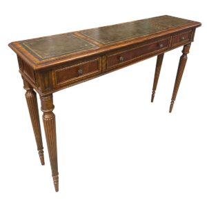 Used 51" Traditional Wood Sofa Table With Three Drawers This elegant sofa table features a leather like inlay surface with three storage drawers, blending function and classic design. Ideal as a hallway accent, entryway organizer, or behind a sofa. Inlay top surface Wood Three storage drawers Dimensions: 51"W x 13"D x 34"H Ideal for entryways, reception areas, or behind sofas in waiting rooms and office lounges.