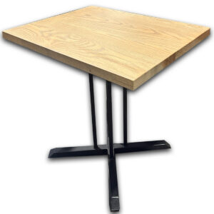 Used Small Bistro Table – Light Oak with Black Base The Used Small Bistro Table features a compact light oak tabletop supported by a black metal base. Its smaller footprint provides a practical table surface without taking up unnecessary floor space. Light oak rectangular tabletop Black metal pedestal-style base Compact 30" × 24" footprint Dimensions: 30" W × 24" D × 30" H This used bistro table could be commercial or residential. It works well in cafés, breakrooms, small dining areas, office kitchens, collaboration spaces, and apartments.