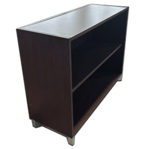 Used 36" W National Epic Series Two-Shelf Bookcase  Compact One-shelf bookcase from National the Epic Series, offering practical storage in a low-profile design suitable for small offices or shared workspaces. Walnut One shelves Compact footprint Dimensions: 36″W x 14″D x 28″H Ideal for private offices, reception areas, or collaborative workstations.
