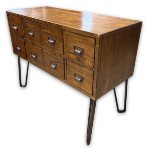 Used 42" W Vintage Style Dresser - Walnut  The Used 8 Drawer Vintage Dresser provides generous storage for supplies, personal belongings, or household items while adding the warmth of natural wood to any space. Featuring eight smooth-gliding drawers and sturdy metal legs, it works well as a storage cabinet, credenza, or dresser in offices and residential settings. Eight spacious drawers for organized storage Wood construction with vintage-inspired hardware Sturdy metal legs provide stability and floor clearance Dimensions: 42" W × 17.5" D × 34.5" H This used dresser could be commercial or residential. It is ideal for executive offices, reception areas, breakrooms, bedrooms, living spaces, or anywhere additional organized storage is needed.