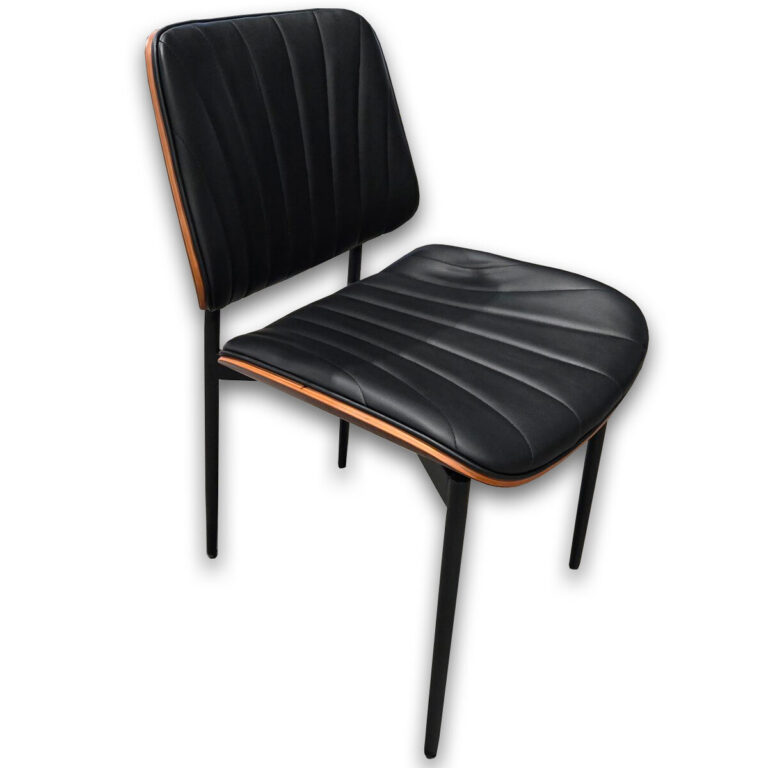 Used Black Vinyl Guest Chair - Walnut Shell Comfortable guest seating designed for meeting rooms, offices, and reception areas at an affordable price.  Black upholstered seat and back for supportive seating Walnut outer shell for a clean professional appearance Slim black metal legs with stable four-point base Dimensions: 21.5W x 20D x 28H Ideal for offices, executive suites, and collaborative workspaces.