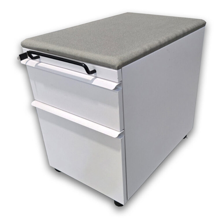 Used White Mobile Box/File Pedestal with Grey Cushion Top This mobile pedestal offers secure storage with a box/file configuration and a cushioned top for added seating or workspace flexibility. Equipped with casters for easy mobility, it’s a practical addition to modern office settings. White Metal Construction Grey Cushion Top Black Pull Handle Locking Storage Box/File Pedestal Casters for Mobility Dimensions: 15"W x 22.5"D x 22"H Ideal for offices, collaborative spaces, and mobile storage needs.