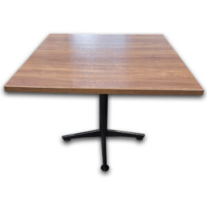 Used 36"W National Square Breakroom Table- Walnut \ Black  Used National square breakroom table featuring a walnut laminate top and black "x" base. The square design provides comfortable seating for small groups while maximizing usable space in breakrooms, cafés, and collaborative areas. 36" square walnut laminate top Black "x" base Commercial-grade construction Dimensions: 36" W × 36" D × 29.5" H Perfect for breakrooms, cafés, employee lounges, and small collaboration spaces.