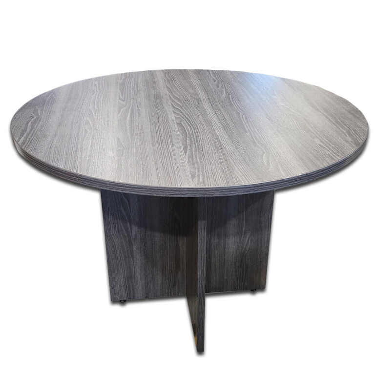 Used 42" Round Meeting Table - Grey Woodgrain This round laminate table offers a practical meeting surface with a clean, professional finish, perfect for collaborative office spaces or break areas. Durable laminate surface with woodgrain texture Sturdy panel base for stability Easy-to-clean and scratch-resistant finish Compact size ideal for small meeting areas or lounges Dimensions: 42" Diameter x 30"H Perfect for conference rooms, break areas, or small group collaboration settings.