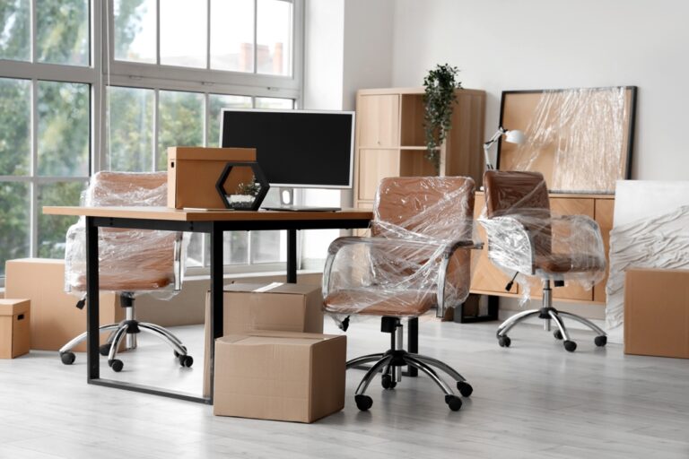 Interior,Of,Modern,Office,With,Chairs,Wrapped,In,Stretch,Film
