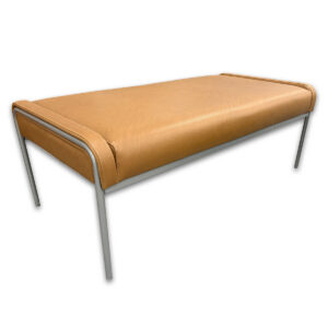 Used Rule of Three Bench - Whisky Upholstery Clean, functional bench seating designed for waiting areas, collaborative spaces, or flexible seating zones. The upholstered top provides a comfortable surface while the metal frame keeps the footprint light and easy to place. Upholstered in whisky tone synthetic leather Thick cushioned seat for extended seating comfort Steel frame with slim profile legs • Compact footprint fits along walls or in open areas Works well as standalone seating or paired in multiples Commercial grade construction suitable for daily use Perfect for lobbies, reception areas, and collaborative workspaces.