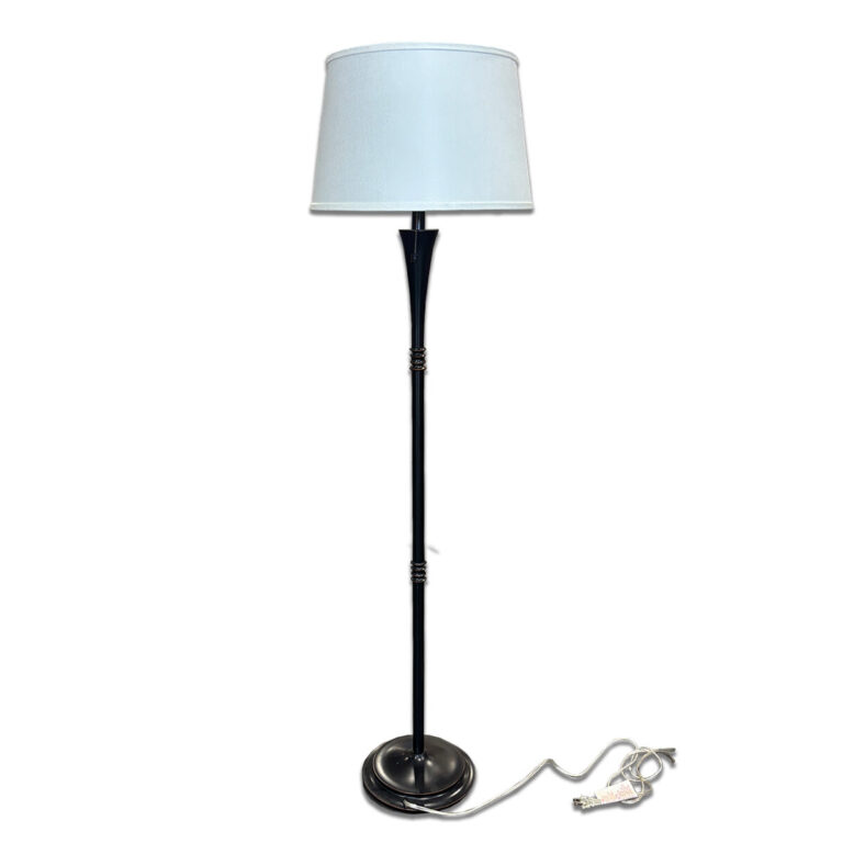 Used 62"H Standing Lamp White Shade This standing lamp features a sturdy metal base and a classic white fabric shade, providing reliable lighting for both residential and commercial spaces. Its tall design makes it perfect for adding soft, ambient light to any room. Metal base with stable round foot White fabric lampshade Standard plug-in power cord Overall Dimensions: 17"W x 17"D x 62"H Perfect for offices, reception areas, and living spaces.