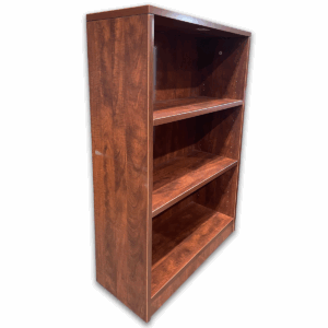 Used OTG 3-Shelf Bookcase in American Dark Cherry – 37″H Compact and functional, this 3-shelf bookcase offers stylish storage for books, binders, and display items. Finished in American Dark Cherry  Two Adjustable-height shelves Finished back panel Dimensions: 32″W x 14″D x 37″H Perfect for private offices, reception areas, or shared workspaces.
