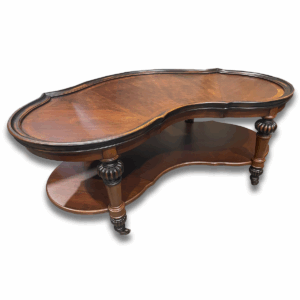 Used 50" W Kidney-Shaped Coffee Table in Walnut Finish This unique wood coffee table features a smooth walnut finish and a distinctive kidney shape, adding a touch of character to any setting. Its curved design creates visual interest while offering a functional surface for everyday use. Kidney-shaped wood top Warm walnut finish Dimensions: 50"W x 30"D x 20"H Ideal for lobbies, lounge areas, and waiting rooms.