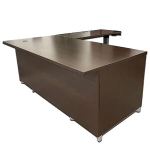 Used National Epic 72″ W L-Shape Desk W/ 48″ W Sit-Stand Hand-Crank Return – Espresso – Right Handed Complete workstation setup in espresso finish featuring both fixed and height-adjustable surfaces. Includes integrated storage and wire management to support productivity in any modern workspace. 72″ W desk with fixed-height surface 48″ W sit-stand hand-crank return with cable management Fixed box/box/file pedestal with gray pull handles Lower storage cubby beneath the desk Gray metal feet for modern contrast Dimensions: Desk: 72″W x 30″D x 30″H Return: 48″W x 24″D x Adjustable Height ( manual hand-crank)  Ideal for executive offices, open workstations, or private suites.