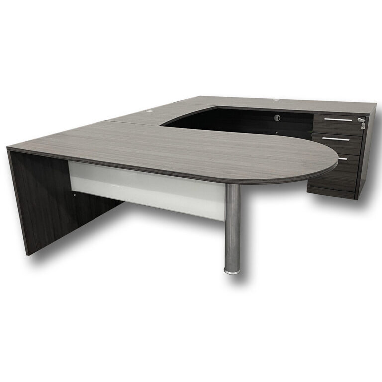 Used 72" W CorpDesign U-Shape Bullet Top Desk in Grey This U-shape desk provides a professional and functional layout with a bullet top design and integrated storage pedestal. Finished in a grey wood-grain laminate, it includes a white glass modesty panel and soft-close drawers, offering both practicality and style. The universally handed configuration allows setup as either right-hand or left-hand to suit your space. Grey Wood-Grain Laminate Finish Bullet Top Desk with White Glass Modesty Panel Universally Handed (Right- or Left-Hand Setup) Box/Box/File Locking Pedestal Standard Soft-Close Drawers Dimensions: Desk: 72"W x 36"D x 30"H Bridge: 42"W x 20"D x 30"H Return: 72"W x 24"D x 30"H Ideal for private offices, executive suites, and collaborative workspaces.