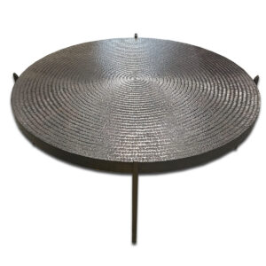 Used 40" Black Textured Round Coffee Table This round coffee table features a textured black top with a sturdy metal base, offering reliable surface space for lounge or reception areas. Textured black top with circular pattern Metal base for stable support Low profile height suitable for seating areas Dimensions: 40" Diameter x 15" H Ideal for offices, executive suites, and collaborative workspaces.