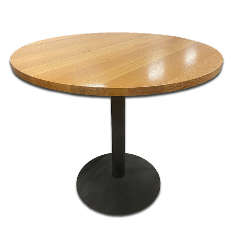 Used 48" Light Natural Oak Round Café Table With Matte Black Base This round light oak café height table with matt black single column base provides a clean and sturdy worksurface suited for break-areas and collaborative spaces.  Light natural oak top Matte black single-column base Stable round steel foot Dimensions: 48"Diameter x 43"H Perfect for cafés, breakrooms, and collaborative workspaces.