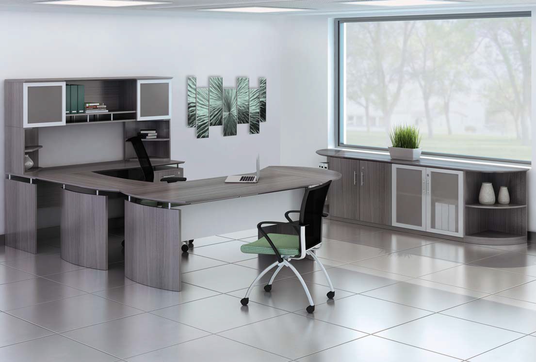 Modern executive office with an L-shaped desk, ergonomic chairs, large window, and organized storage cabinets, creating a professional and spacious workspace.