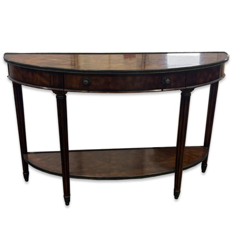 Used 54"W Dark Brown Traditional Half-Moon Console Table This elegant dark brown console table features a half-moon design with a lower shelf for added storage or display. Its smooth wood finish and decorative drawer accents make it both functional and refined. Dark brown wood finish Half-moon tabletop design Decorative drawers with metal pulls Lower shelf for additional storage or display Dimensions: 54Wx18Dx34H Perfect for entryways, reception areas, or executive offices.